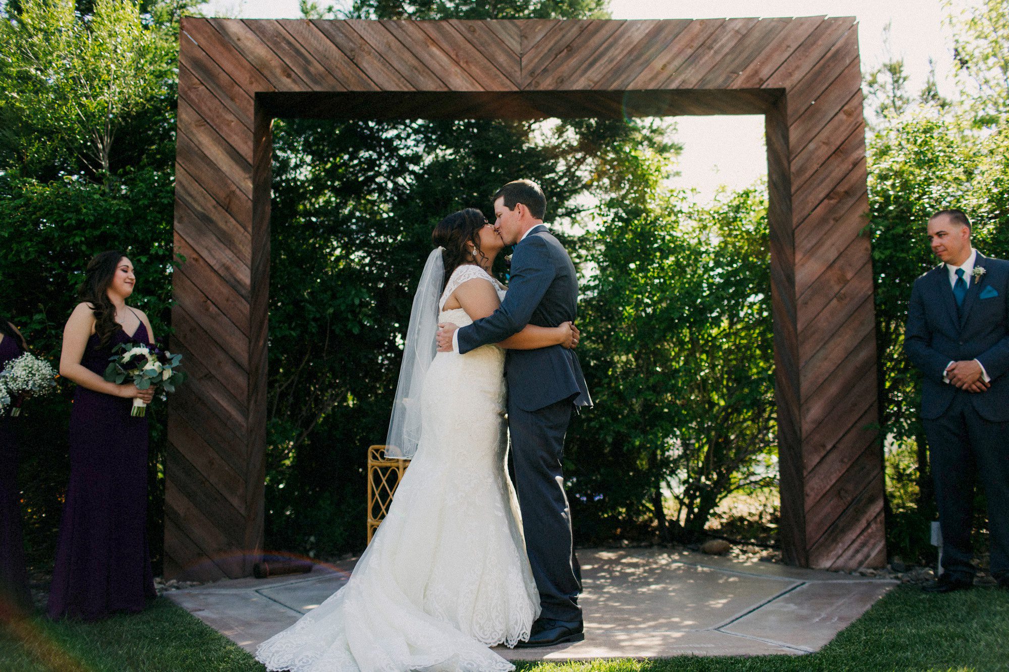 bride and groom ceremony at the grace marlin estate and gardens wedding by san luis obispo wedding photographer sarah kathleen